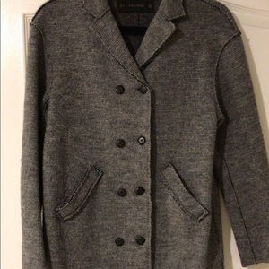 Mid length grey double breasted coat